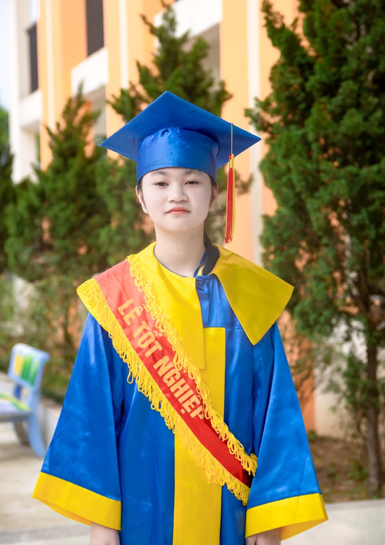 Portrait Of Woman In Graduation Gown