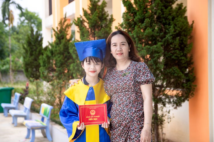 Mother And Daughter In Graduation Day