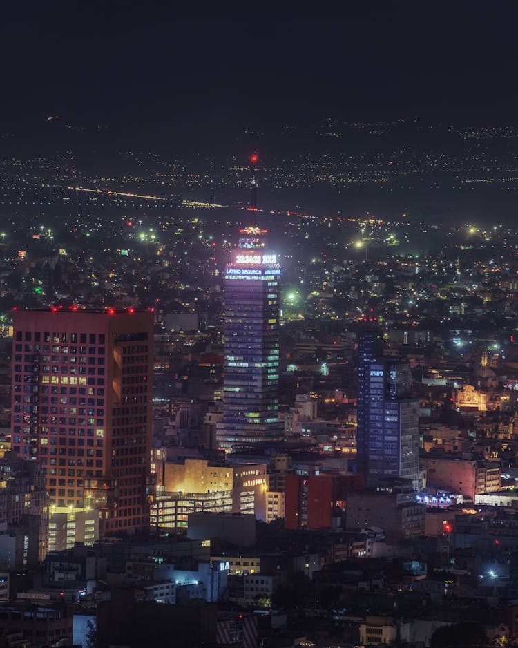 Illuminated La Torre Latino Skyscraper At Night