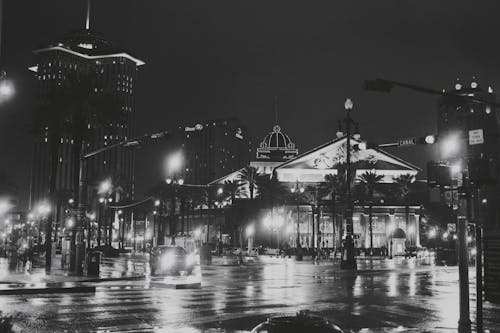 Grayscale Photo of City Street during Nighttime