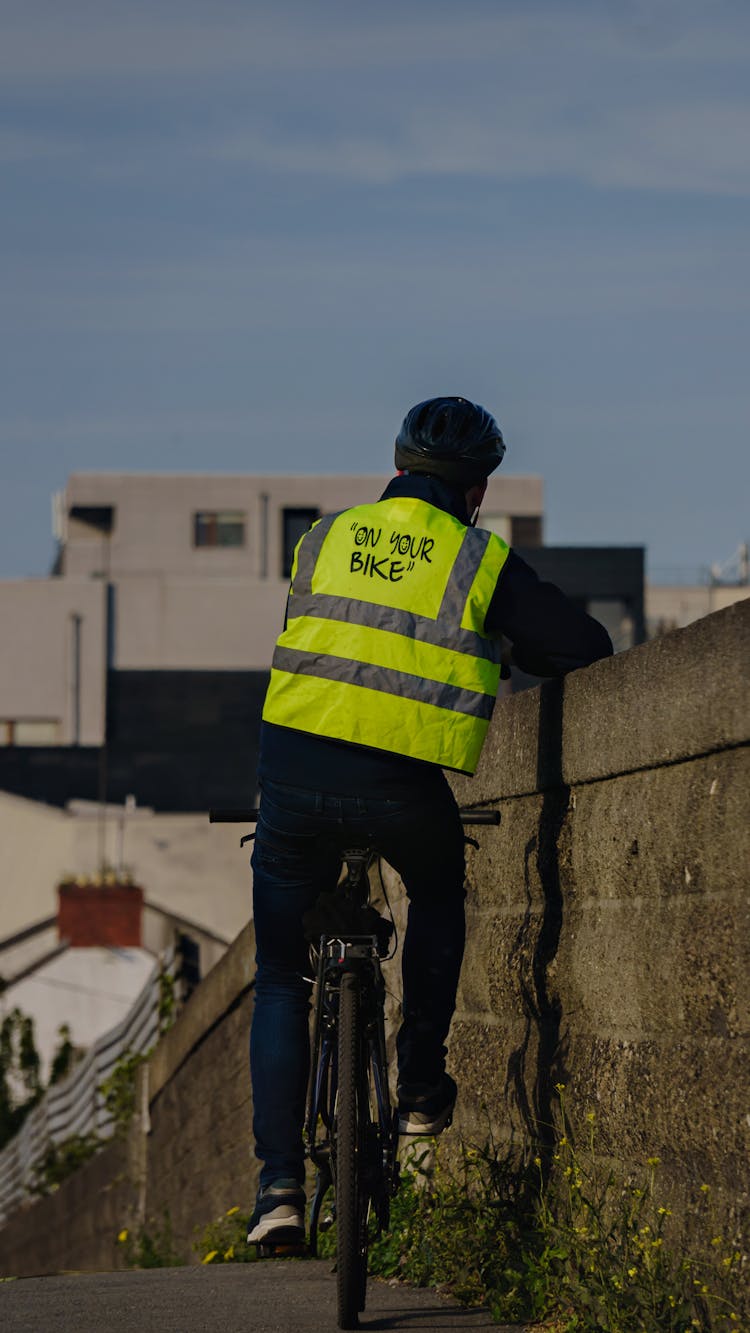 A Bicyclist Wearing Reflective Vest