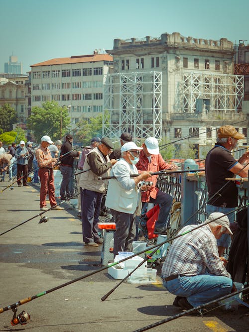 People Fishing on the Bridge