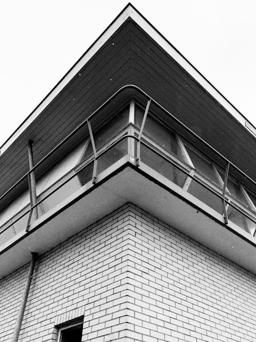 Grayscale Photo of a Concrete Building