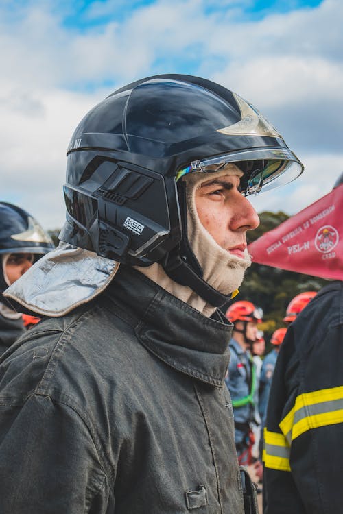Firefighter in Protective Helmet