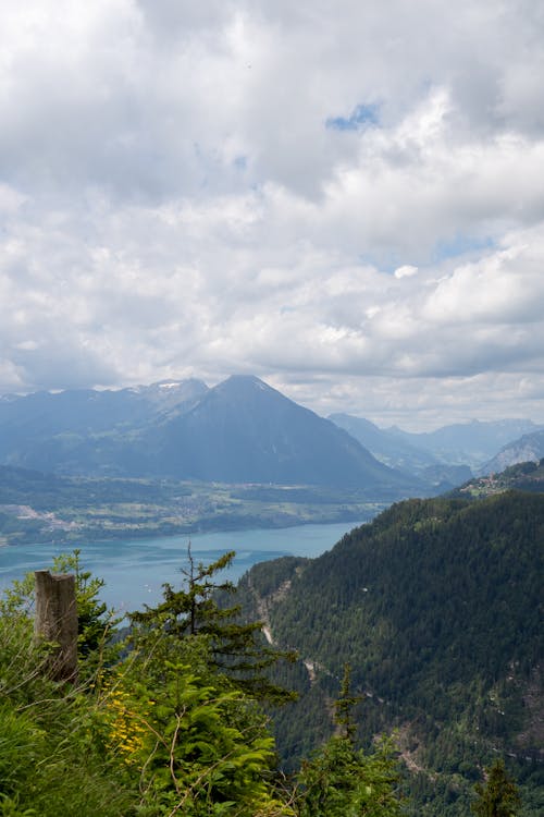 Aerial Photography of Mountains under the Cloudy Sky