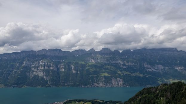 Aerial Photography of Mountains under the Cloudy Sky