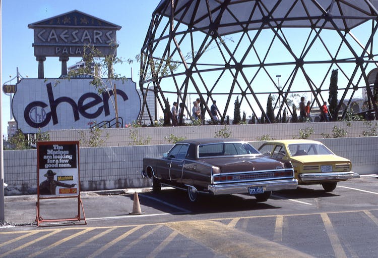 Vintage Cars On The Parking Lot In Front Of Caesars Palace, Las Vegas, United States 