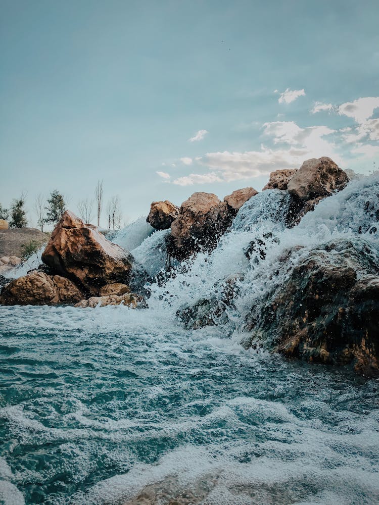 Closeup Of A Rock Dam And Water Splash