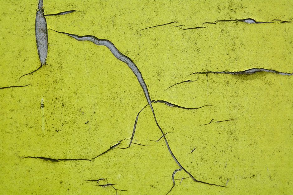 Alligatoring and cracks on a weathered GRP roof surface - fibreglass flat roof repair Alligatoring and cracks on a weathered GRP roof surface - fibreglass flat roof repair
