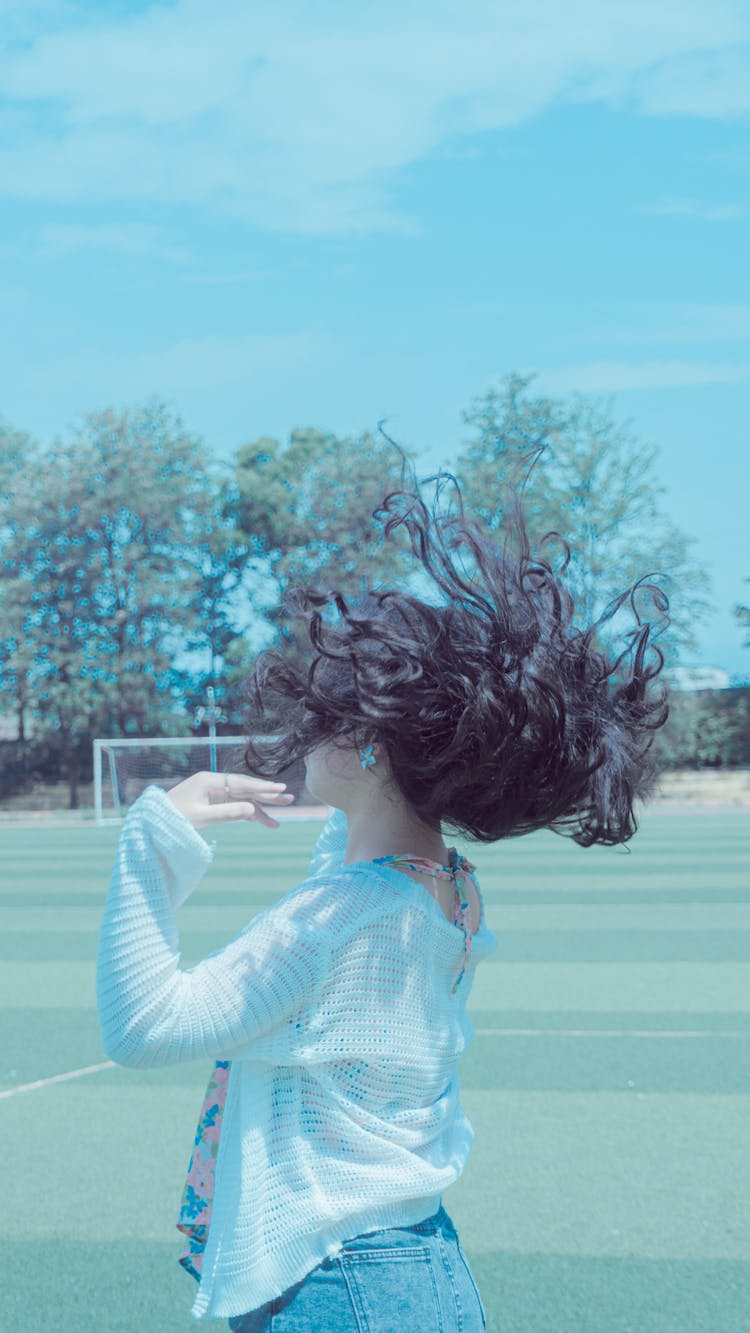 Woman Throwing Her Hair Back 