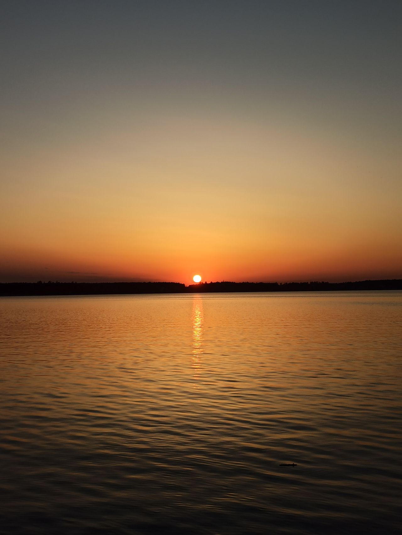 Peaceful sunrise over water