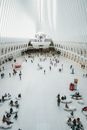People Walking Inside White Building