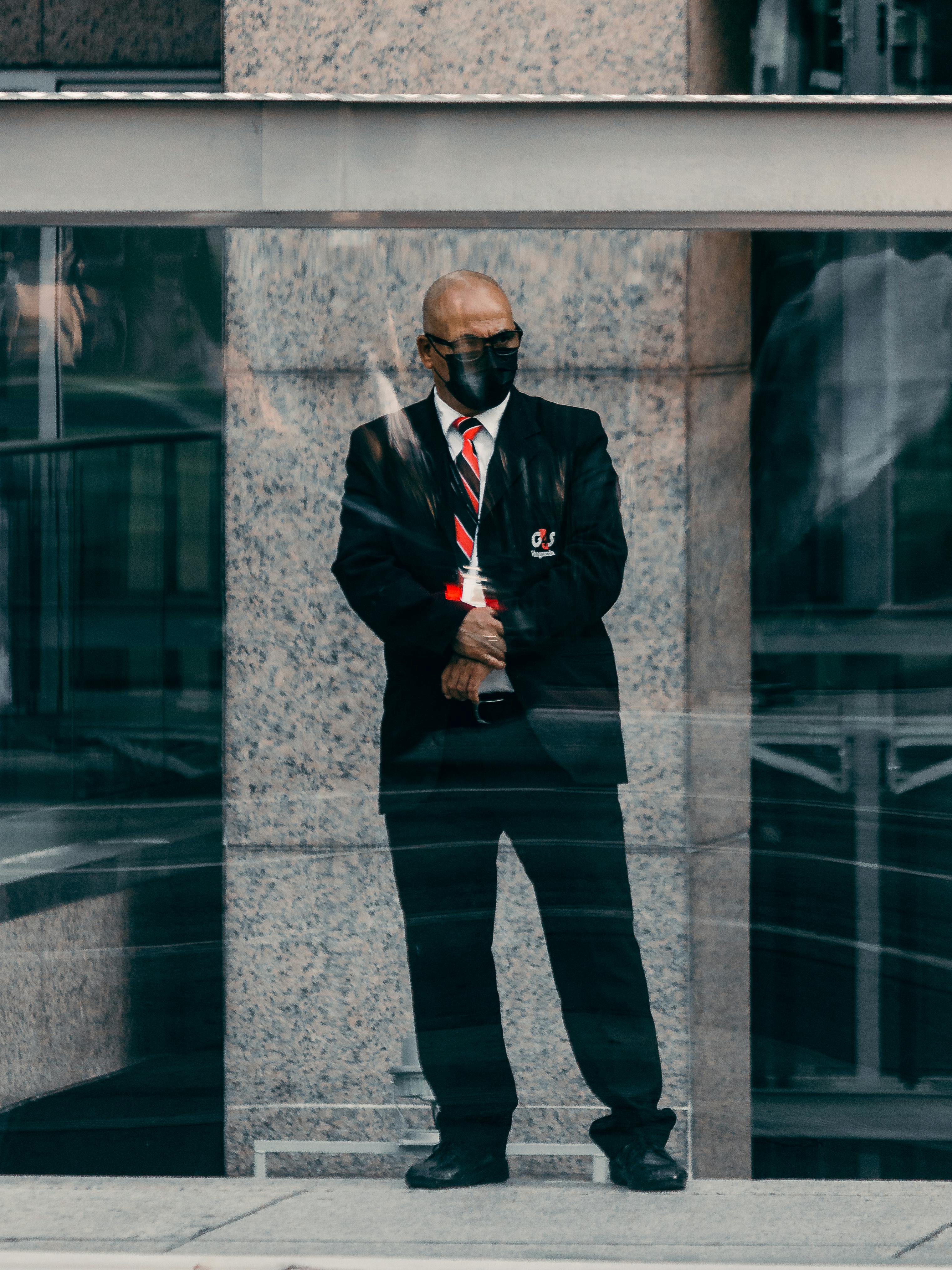A security guard stands on duty.