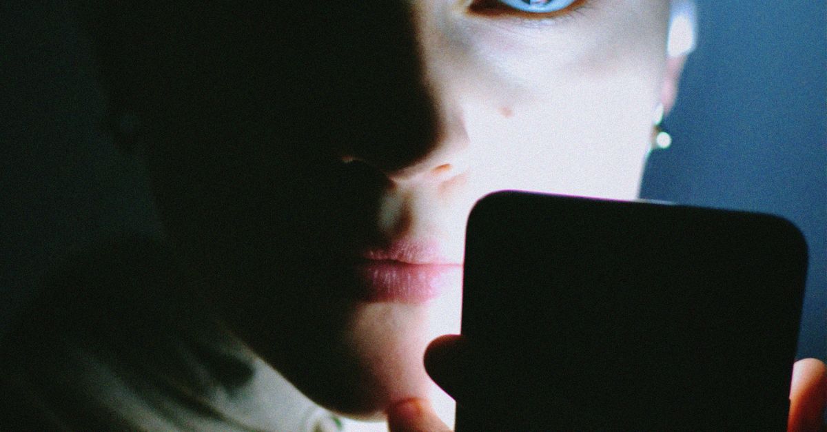 Man Using Cell Phone Light Face Portrait of Person with Face Illuminated by Phone Light · Free Stock Photo