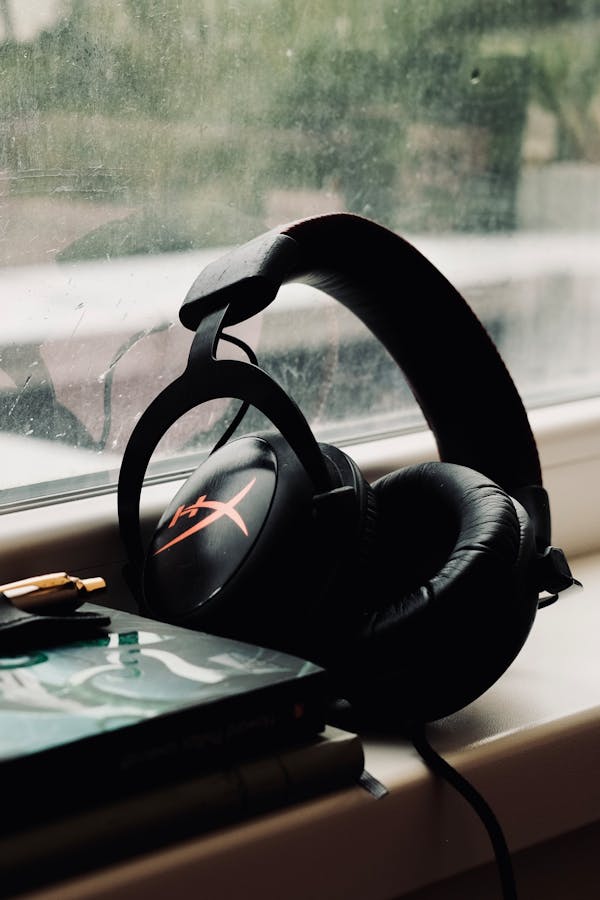 Black Headphones on the Window