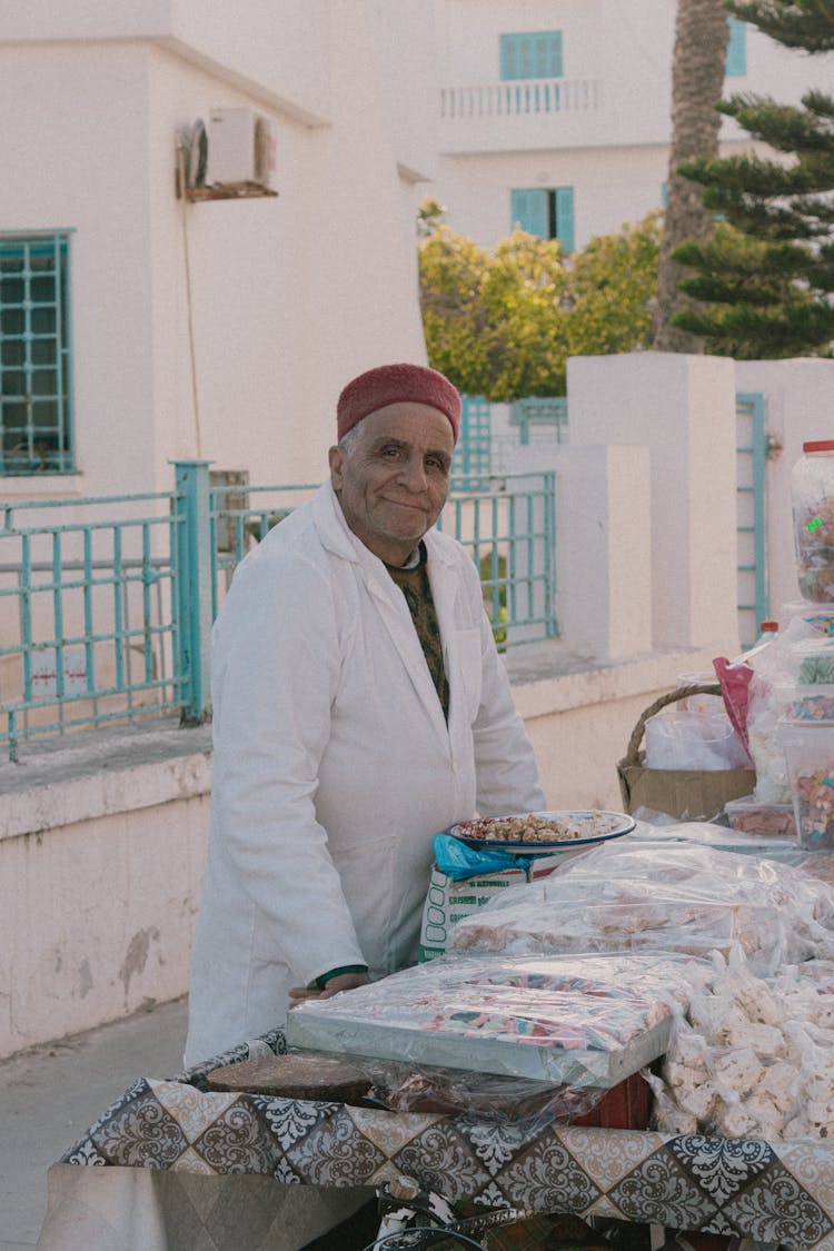 Man Selling Snacks On The Street 