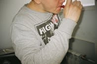 Man in Gray and White Crew-neck Long-sleeved Shirt