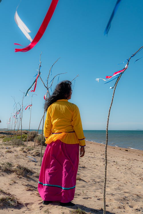 A Woman Standing on a Beach