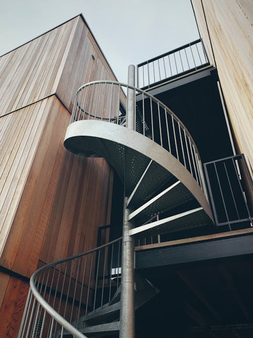 Free Metal Spiral Staircase Outside a Building Stock Photo