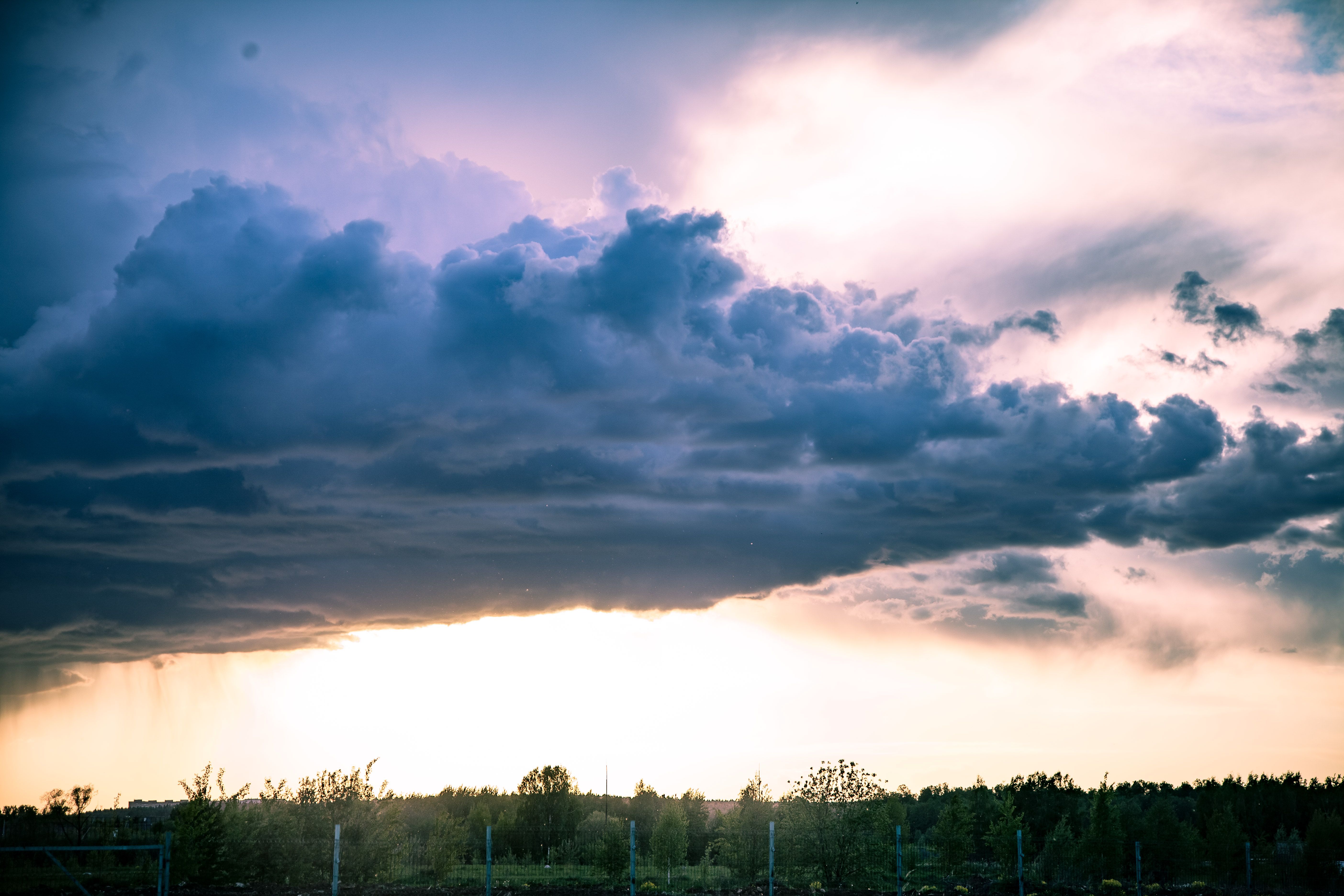 A striking cloud formation captured during a golden hour sunset, highlighting the beauty of nature.