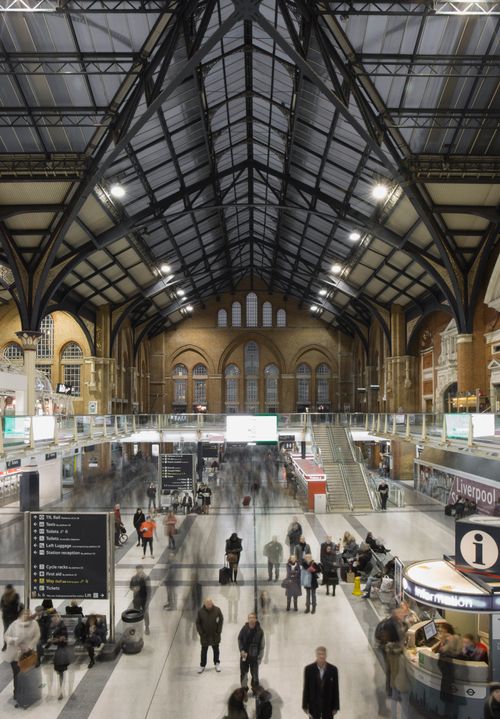 Free Crowded interior of Liverpool Street Station, London, showcasing bustling commuters under steel architecture. Stock Photo