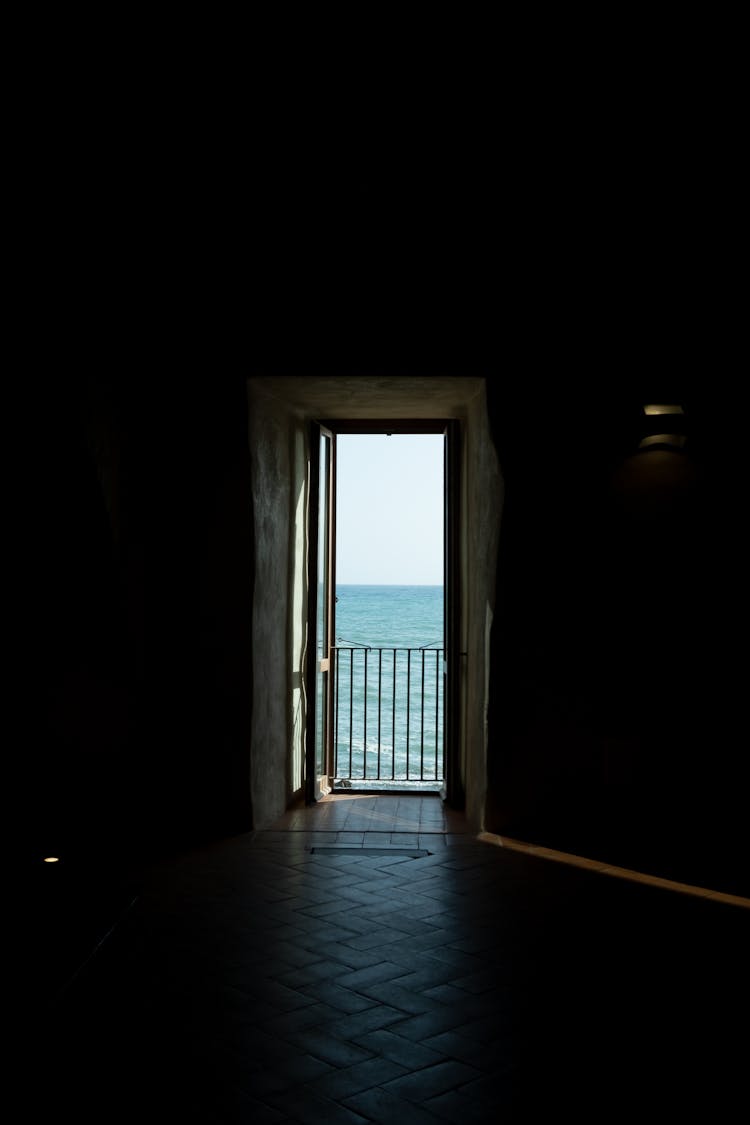 Open Door With A Sea View In A Hallway