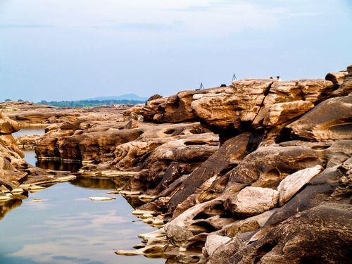 Free Breathtaking view of rocky landscape by water in Sam Phan Bok, a natural landmark in Thailand. Stock Photo