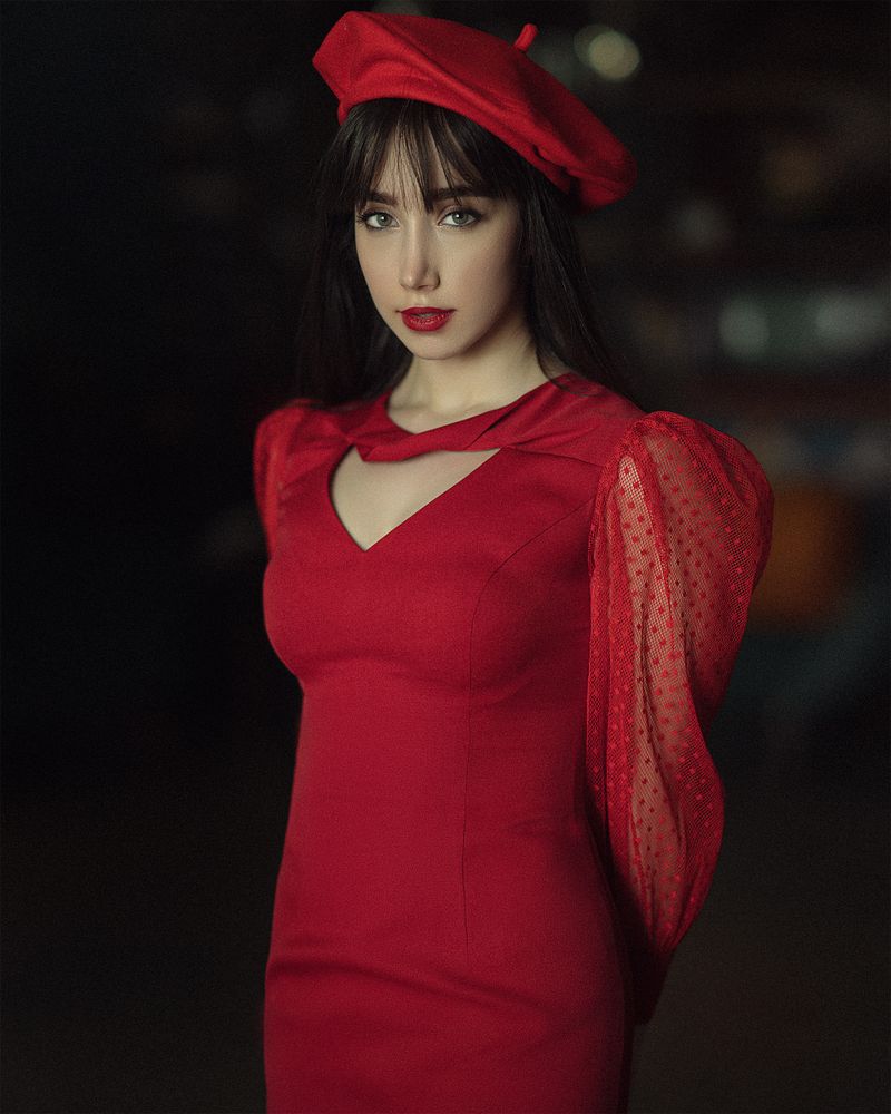 Woman in a red lace fit-and-flare dress