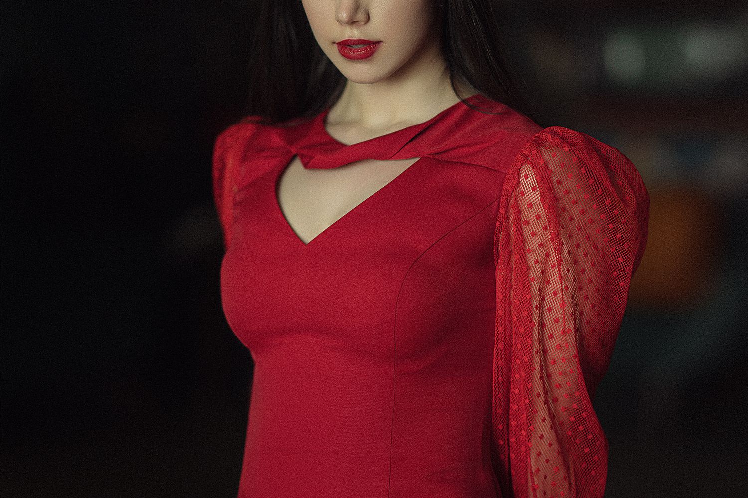 Woman in a red lace fit-and-flare dress