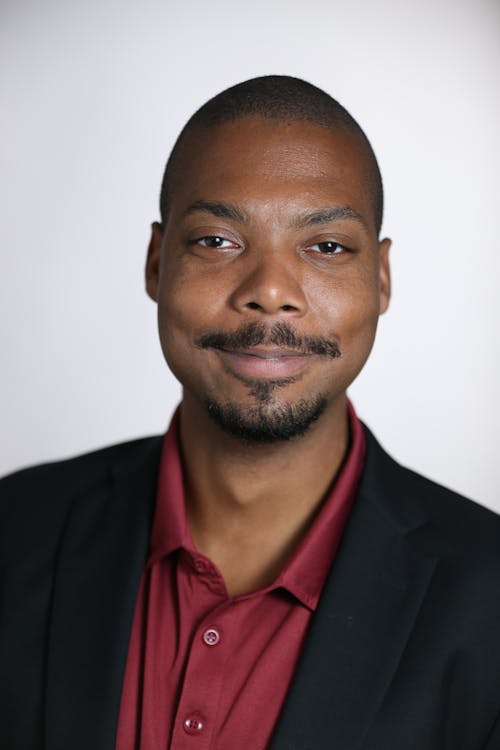 Portrait of a Man Wearing a Suit Jacket