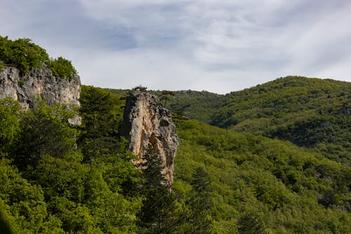 Aerial Photography of Green Mountains under the Sky