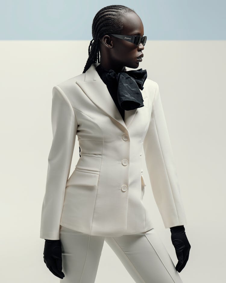 Woman In A White Suit 