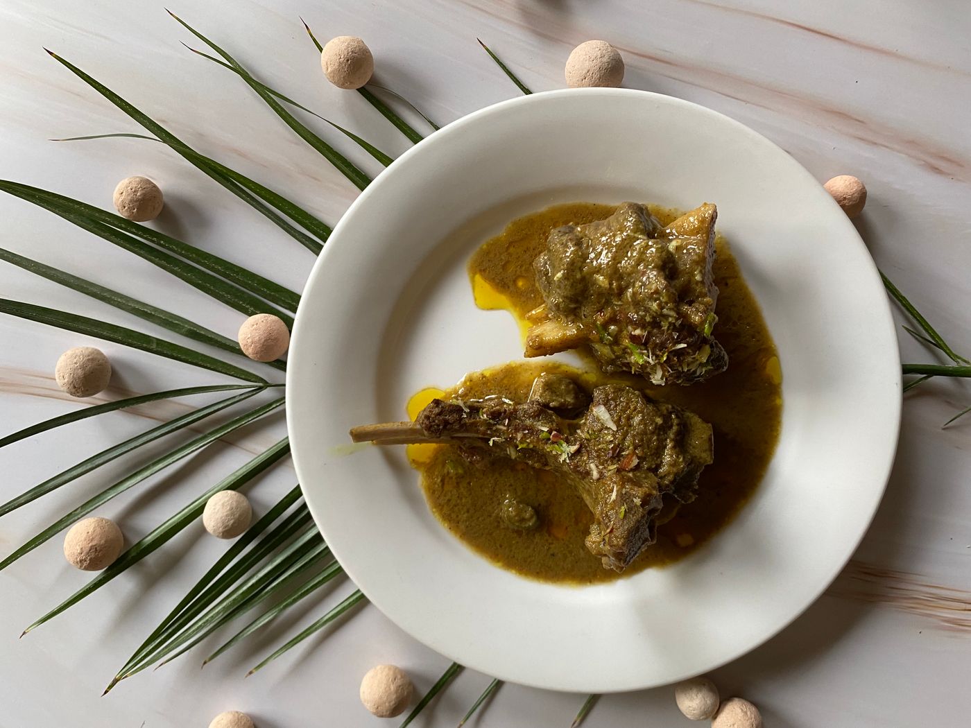 Representative photograph for Coconut lamb curry with spinach and crispy shallots