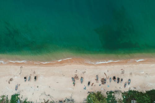 Aerial Photography of Boats on the Beach