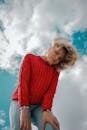 Portrait of a Woman against a Cloudy Sky