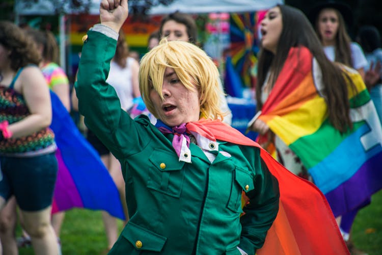 Woman Dancing At A Gay Parade 