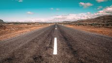 Asphalt Road Between Mountains