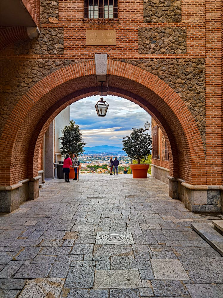 Brick Building With Arch In Old Town