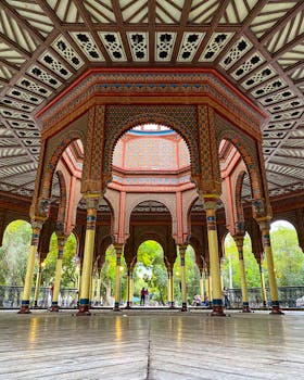 Colorful Moorish pavilion in a Mexican park with intricate patterns and arches.