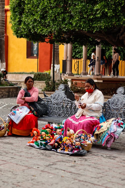 Two Women Selling Souvenirs in the Street