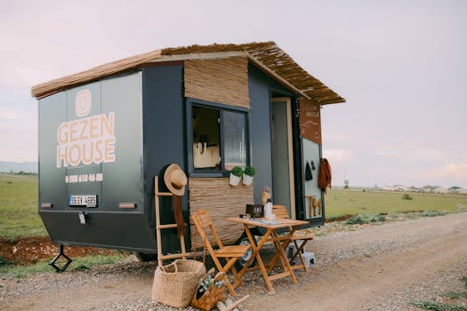 A charming tiny mobile home set in nature, perfect for travel and adventure.