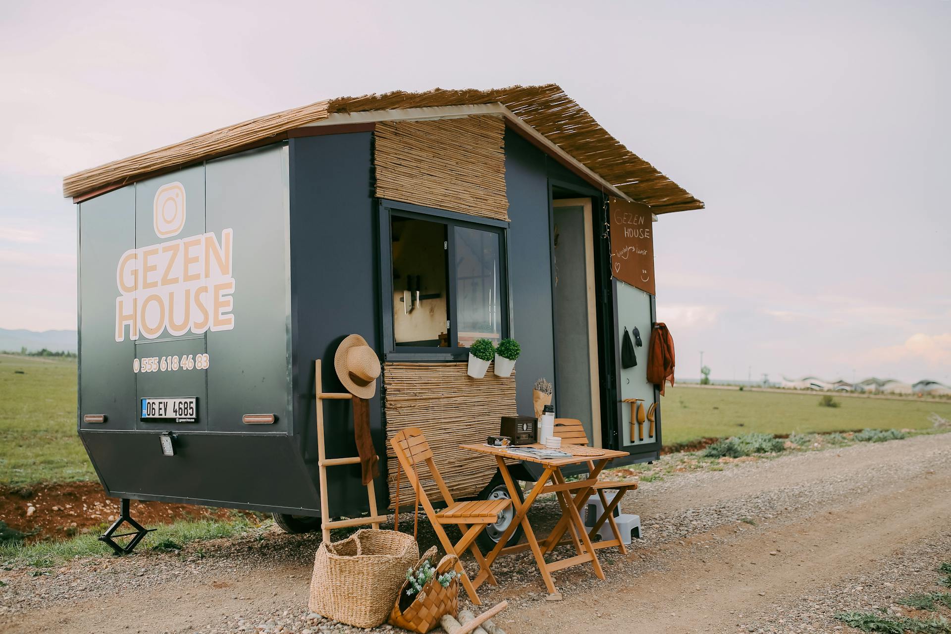 A charming tiny mobile home set in nature, perfect for travel and adventure.