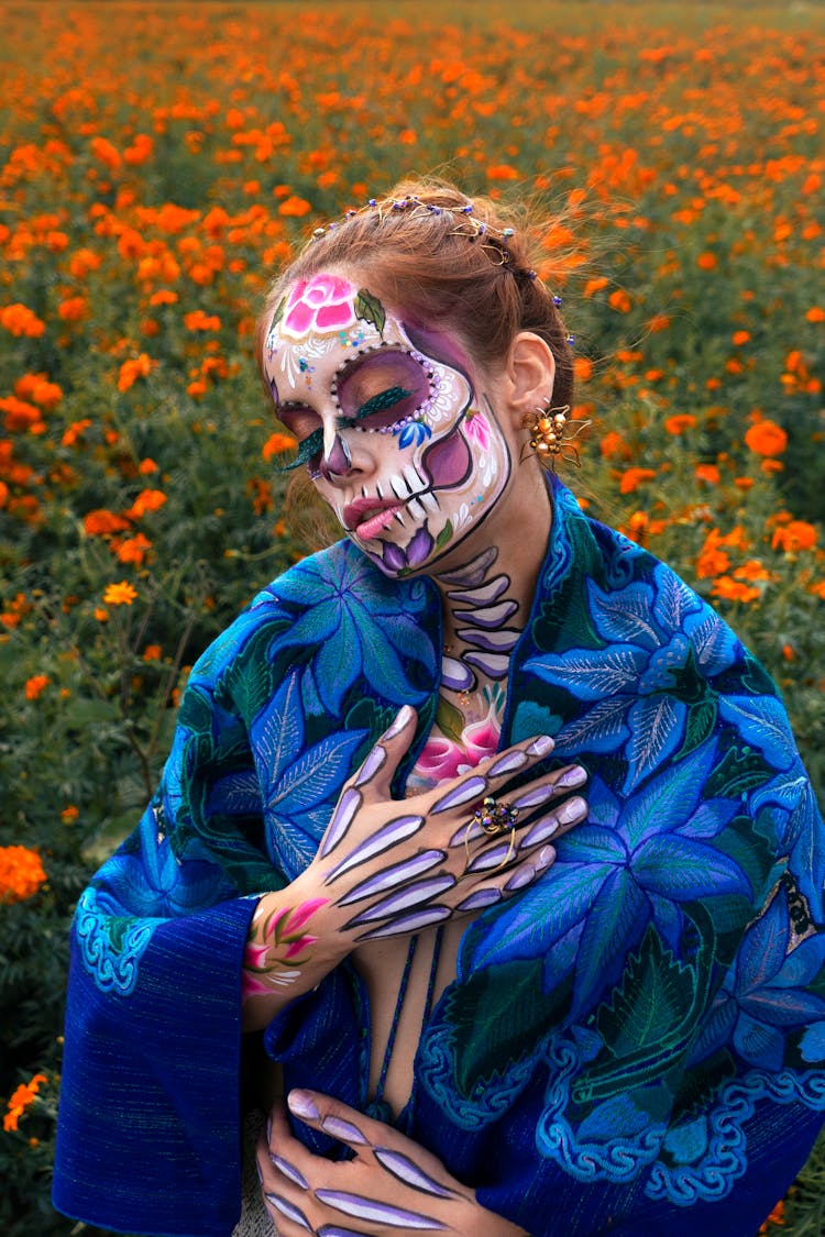 Woman With Painted Death Mask On Face