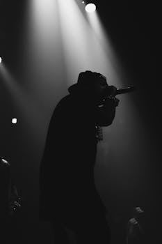 A captivating black-and-white image of a musician performing in New York City.