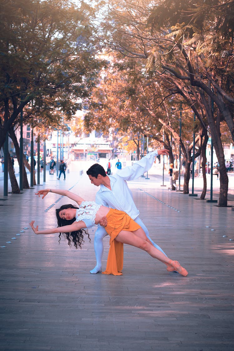 Man And Woman Dancing On The Street