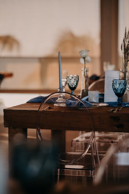 Candle on Wooden Table