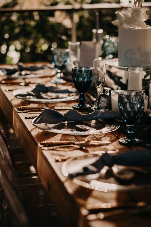 Free Sophisticated dining setup with blue glassware and elegant decor for a special occasion. Stock Photo