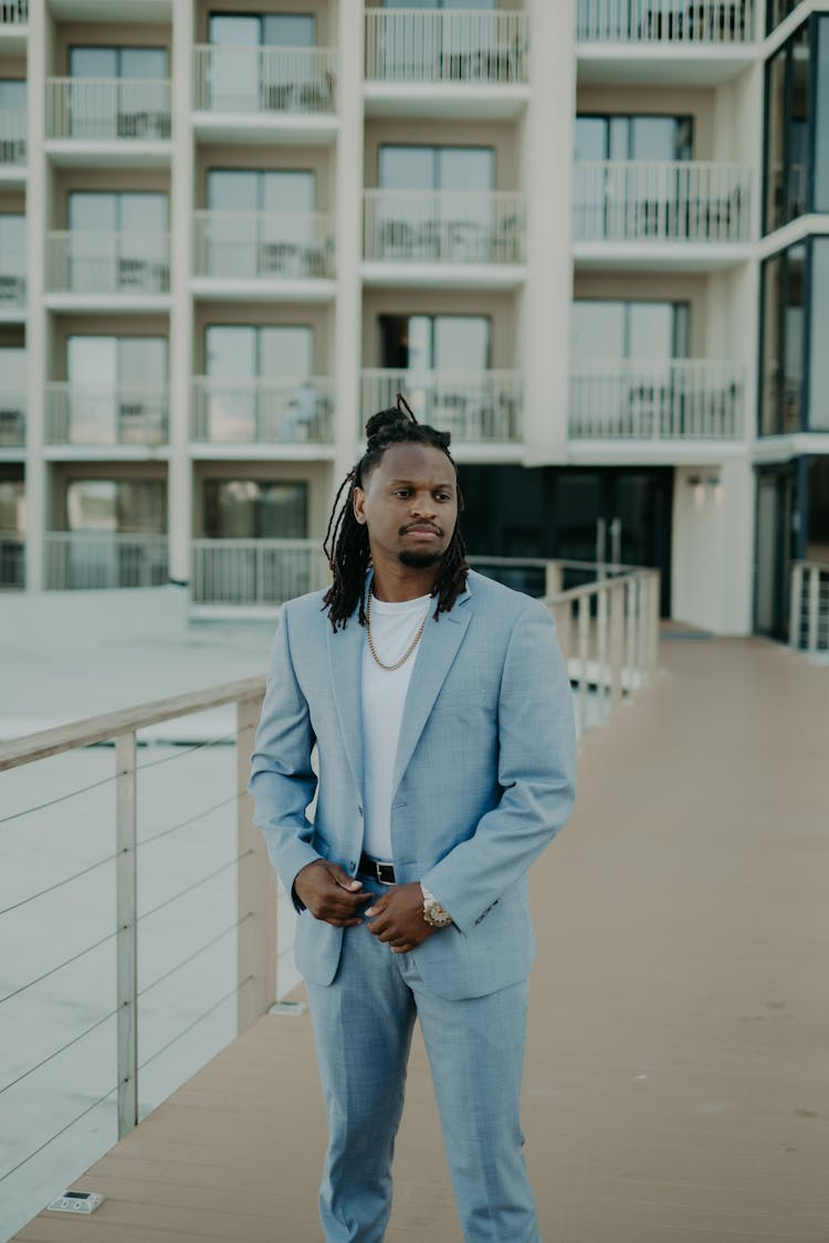 Man With Dreadlocks Wearing Blue Suit