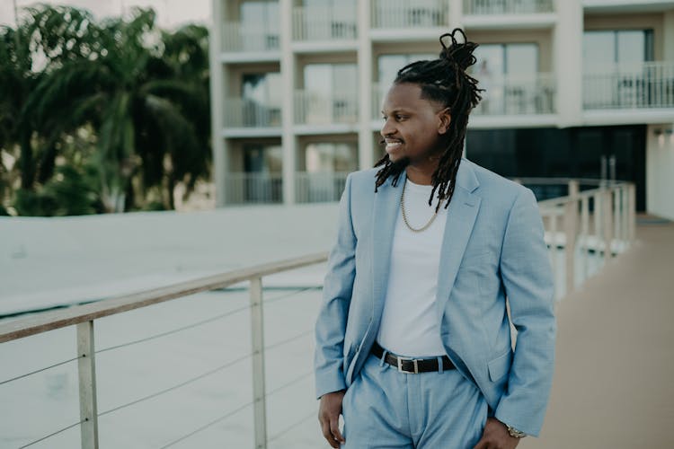 Man With Dreadlocks Wearing Blue Suit