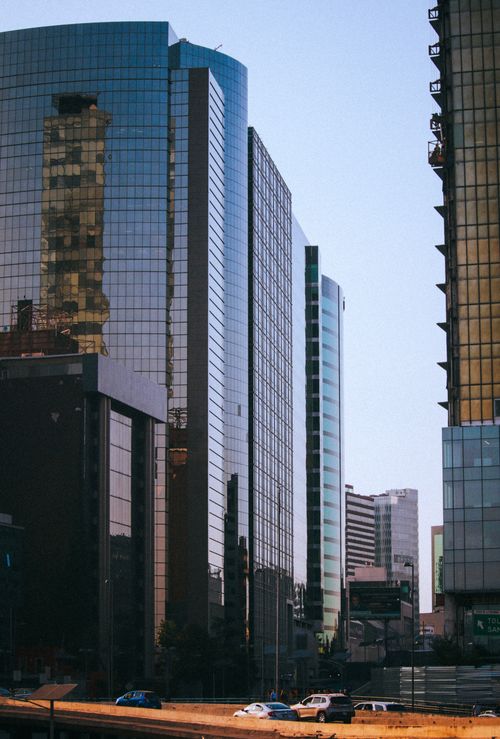 Free A view of modern skyscrapers in Mexico City's urban skyline, showcasing contemporary architecture. Stock Photo